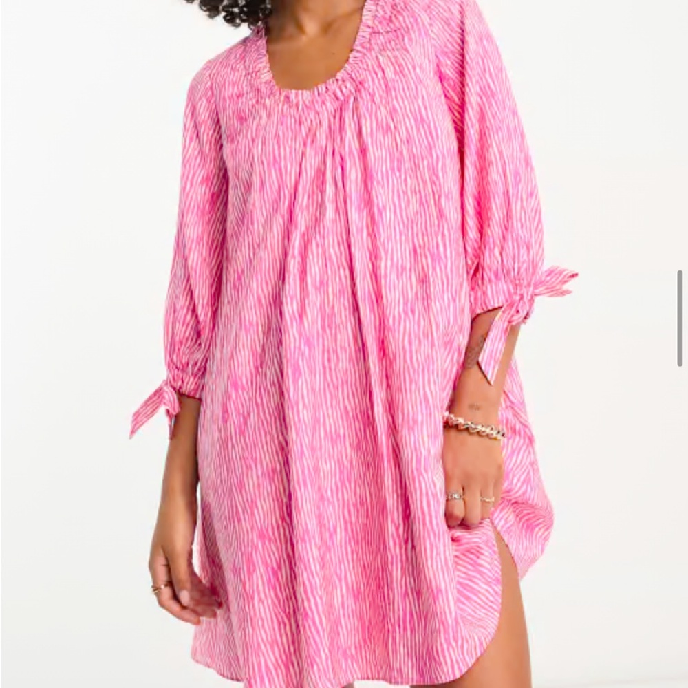 Vibrant Pink Patterned Dress with Bow Sleeves